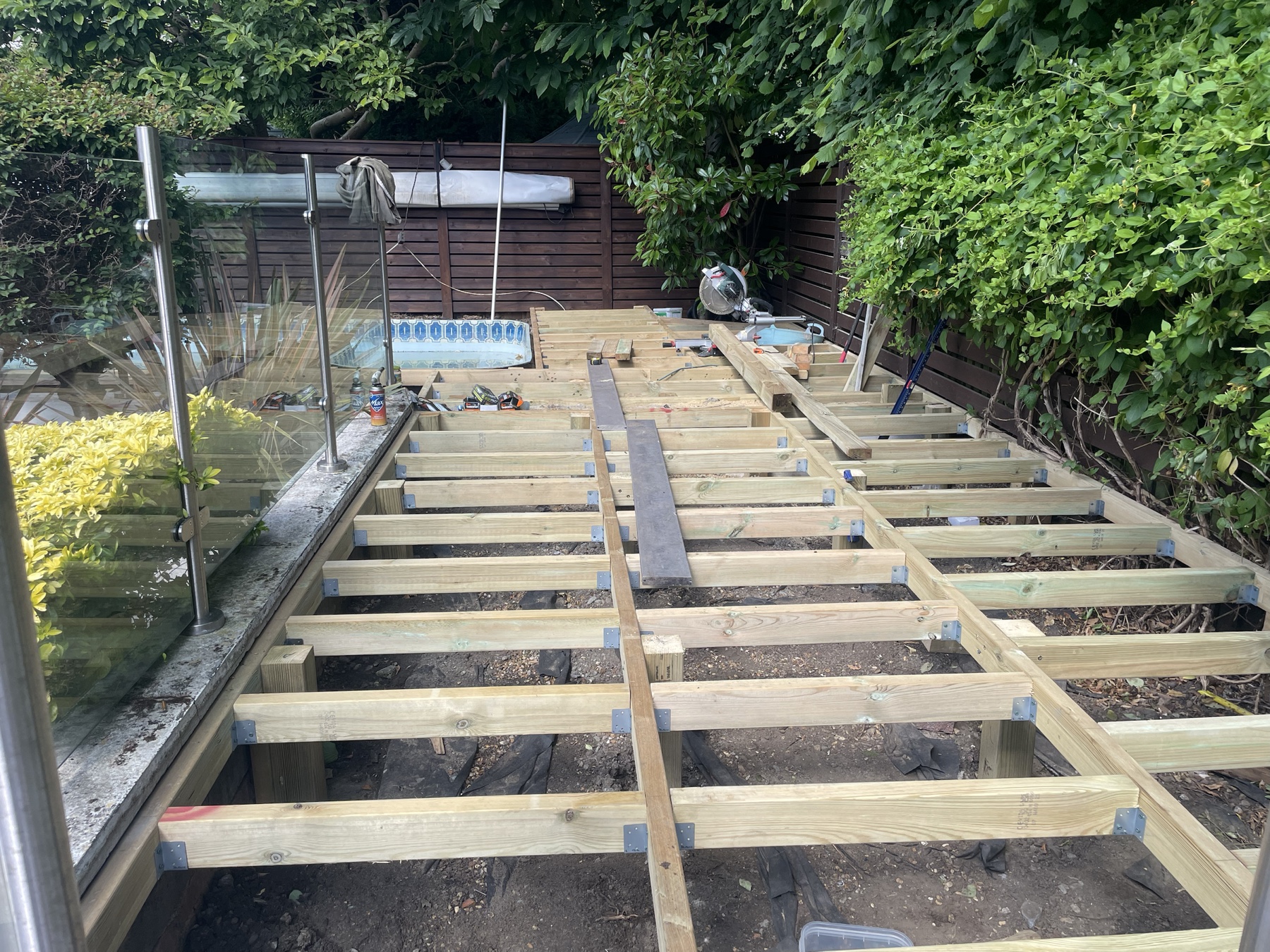 Timber framework being built for a new garden deck