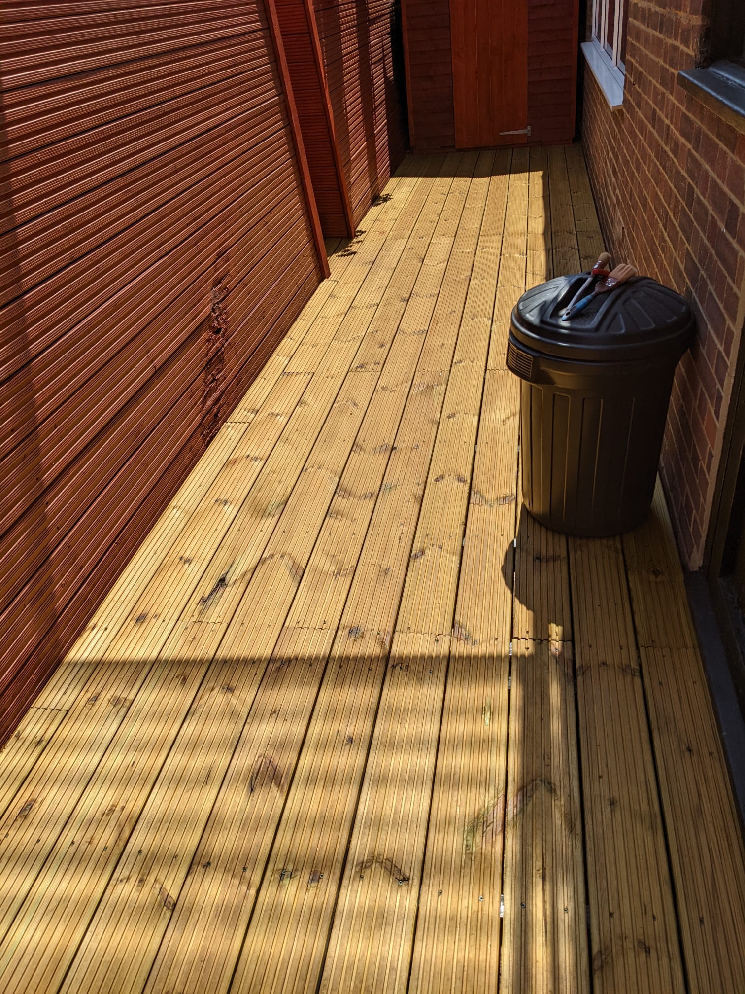 The same side garden finished with new timber decking